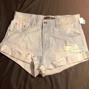 Distressed denim shorts